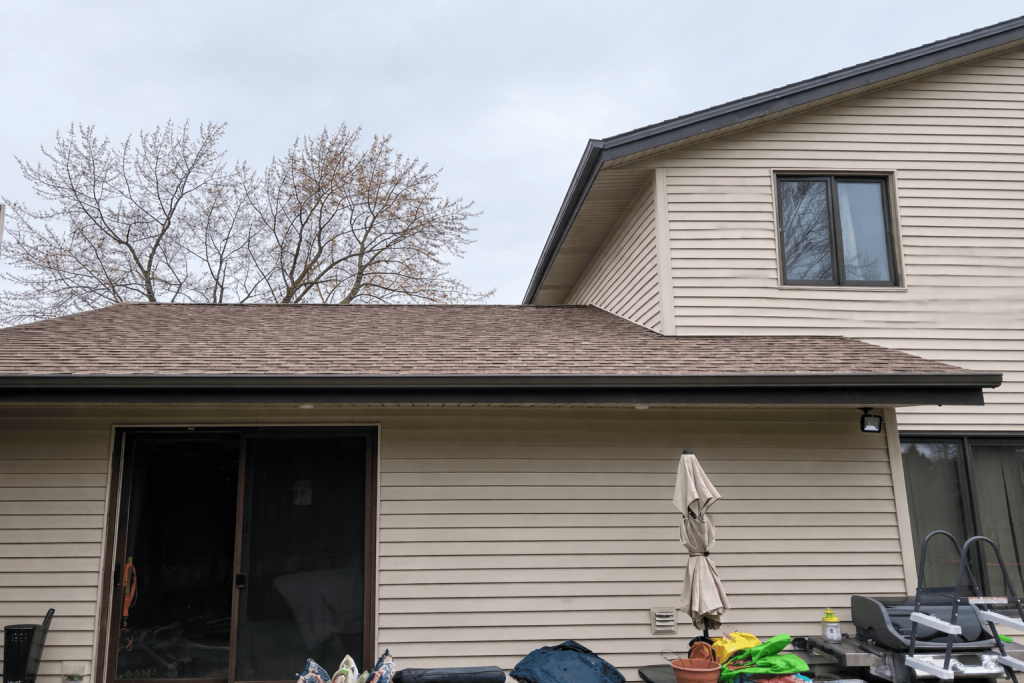 Roof replacement after hail damage in Oak Creek on a two-story gable home